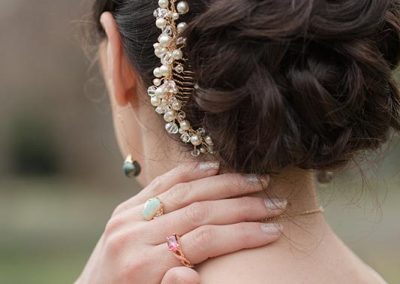 A woman with her hair in the back of her head.