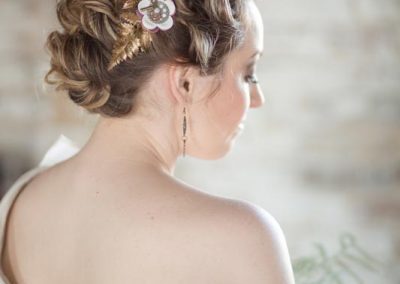 A woman with a flower in her hair.