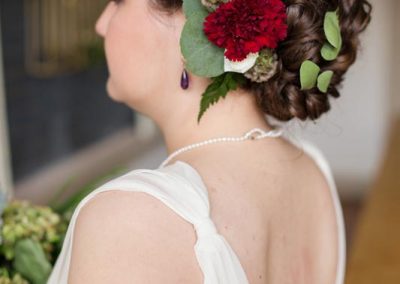 A woman with flowers in her hair.