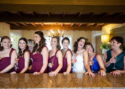 A group of women standing next to each other.