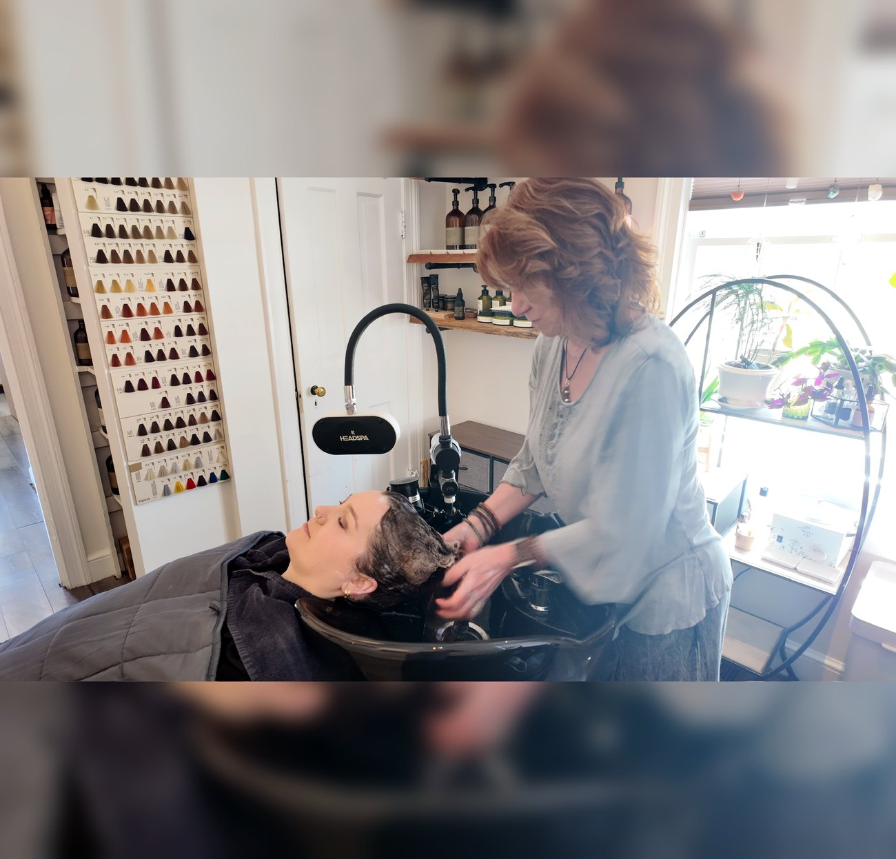 Holistic scalp and hair treatment at the wash station at Enlightened Styles in Warrenton, VA